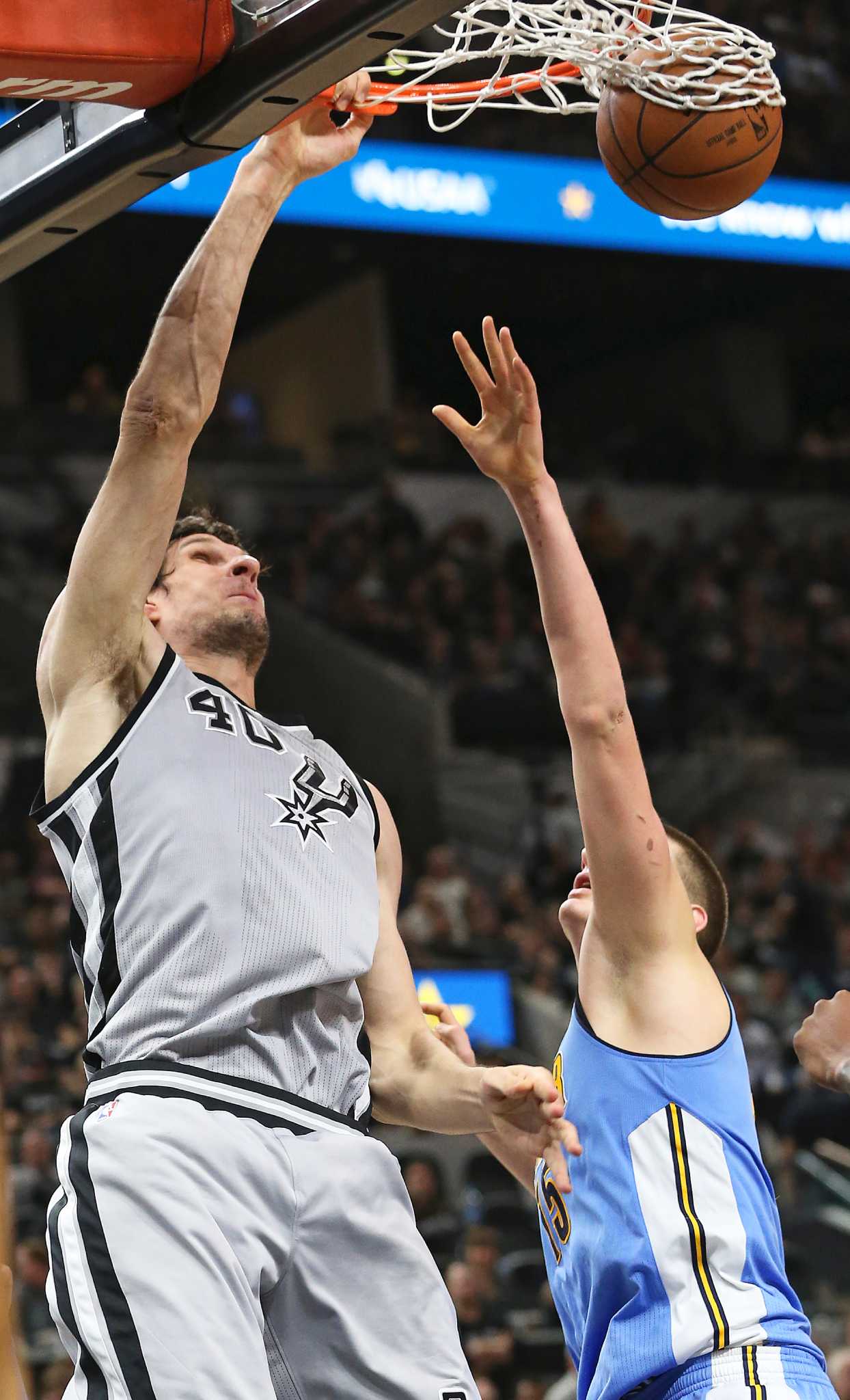 Boban Marjanovic. He ain't pretty but Huge Hands and a Huge Body.