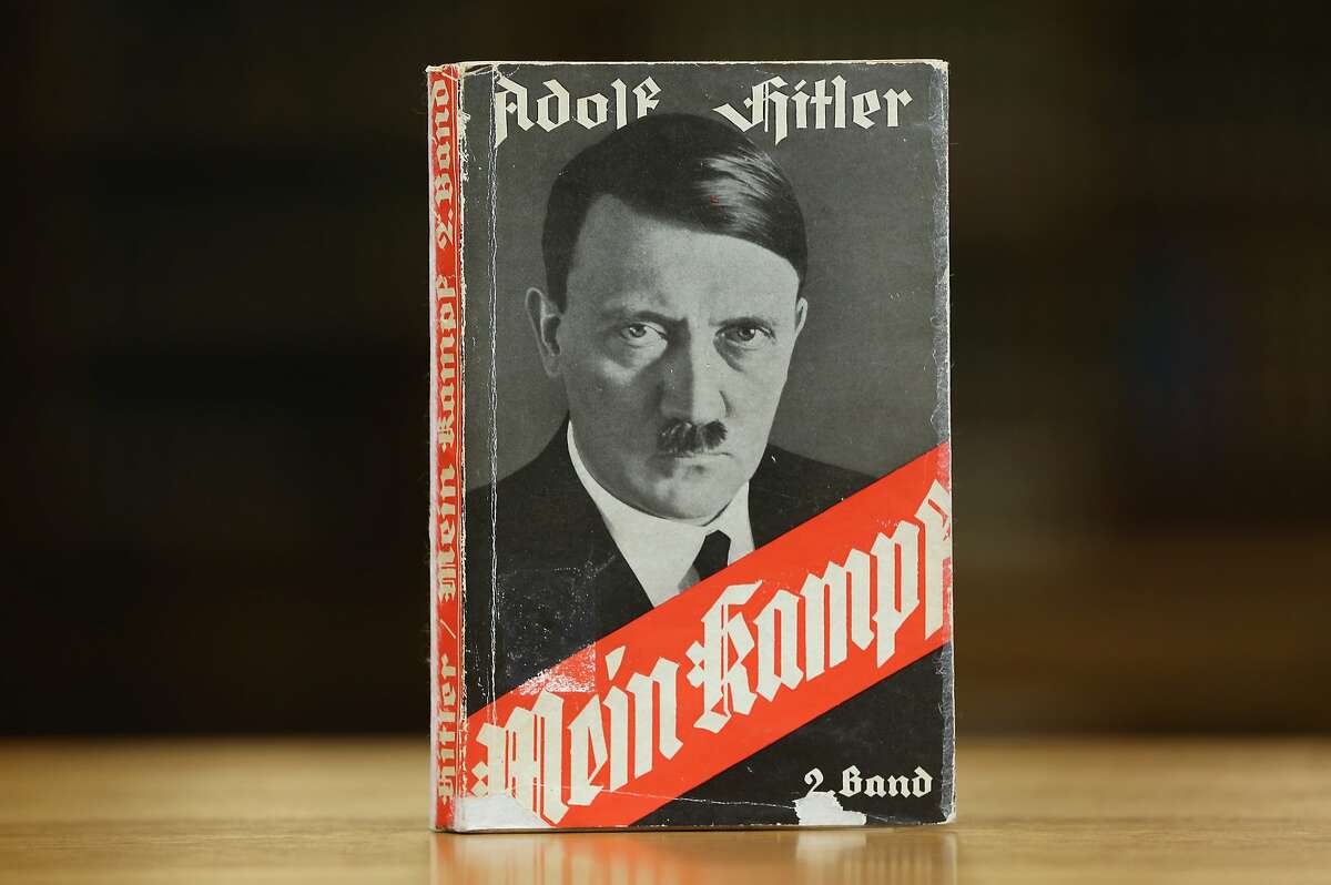 A 1941 edition of Adolf Hitler's "Mein Kampf" ("My Struggle") stands at the library of the Deutsches Historisches Museum (German Historical Museum). Last month it was discovered that the New York Times once published a puff piece on Adolf Hitler summering in his mountain retreat “in the clouds.”