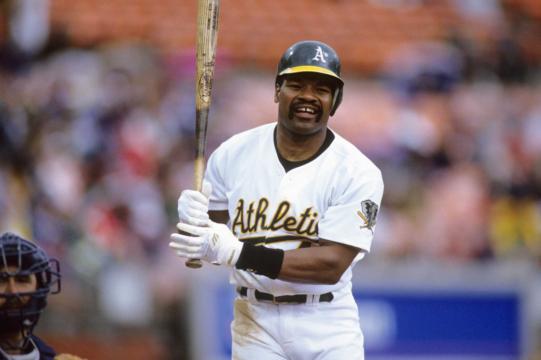 Oakland Athletics - Rickey Henderson poses with Hendu's sons and