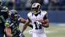 St. Louis Rams' Tavon Austin runs with the ball as Seattle Seahawks' Bobby Wagner gives chase in the first half of an NFL football game, Sunday, Dec. 27, 2015, in Seattle. (AP Photo/Stephen Brashear)