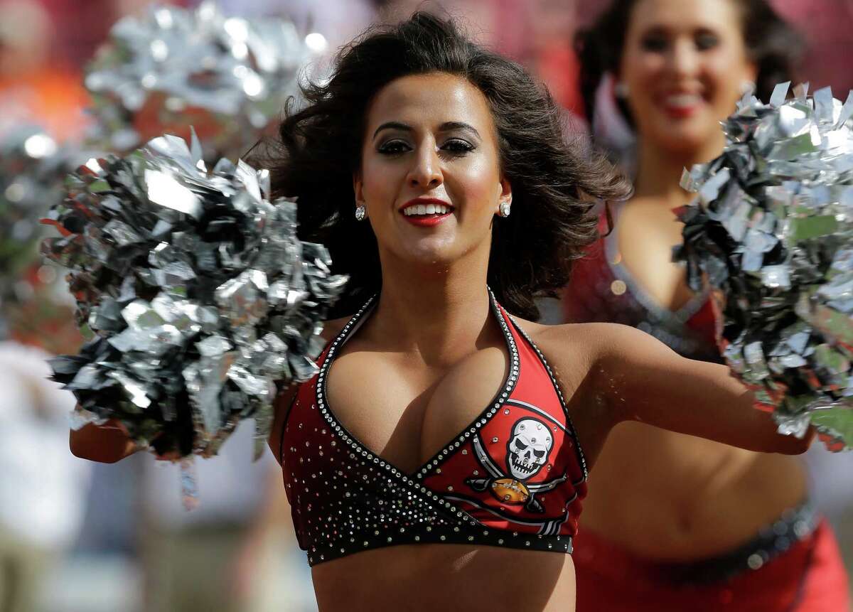 A Tampa Bay Buccaneers cheerleader before an NFL football game against the Chicago Bears Sunday, Dec. 27, 2015, in Tampa, Fla. (AP Photo/Chris O'Meara)
