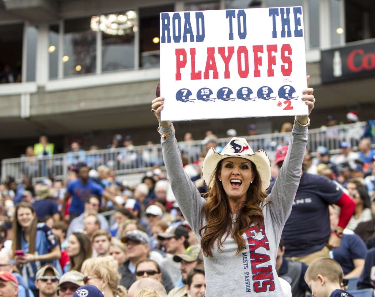 Houston Texans fans cheer in the stands during the second half of