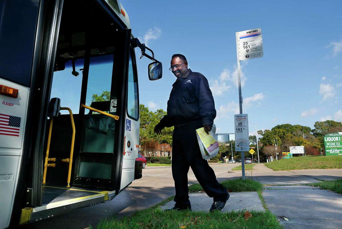 Leo Orville, a Metro bus driver with 31 years of experience, boards his bus after a layover near Wilcrest Drive and Westheimer Road on Dec. 23.