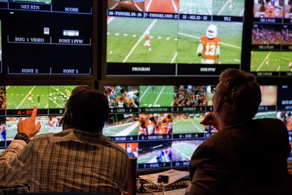 Five years ago, ESPN signed a 20-year, $295-million contract with the University of Texas, broke ground on a new studio and agreed to absorb Longhorn Network production costs pegged at an estimated $26 million a year. , according to the contract details The Longhorn Network "Game Day" production is filmed Nov. 7 on set before the football game against the University of Kansas at the University of Texas at Austin campus.