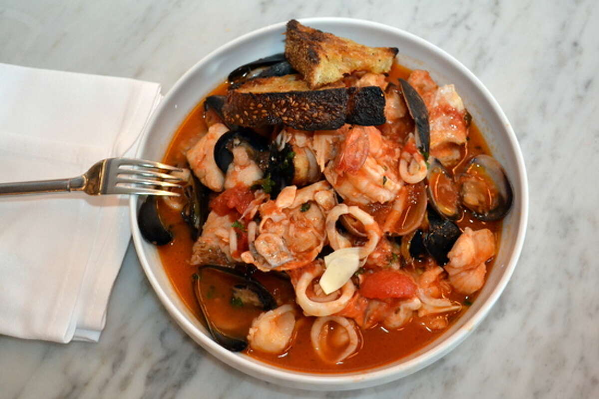 Cioppino: Cioppino (pronounced choh-pee-noh) is an Italian-American fish stew with tomatoes and a variety of fish and shellfish. Region: San Francisco, California