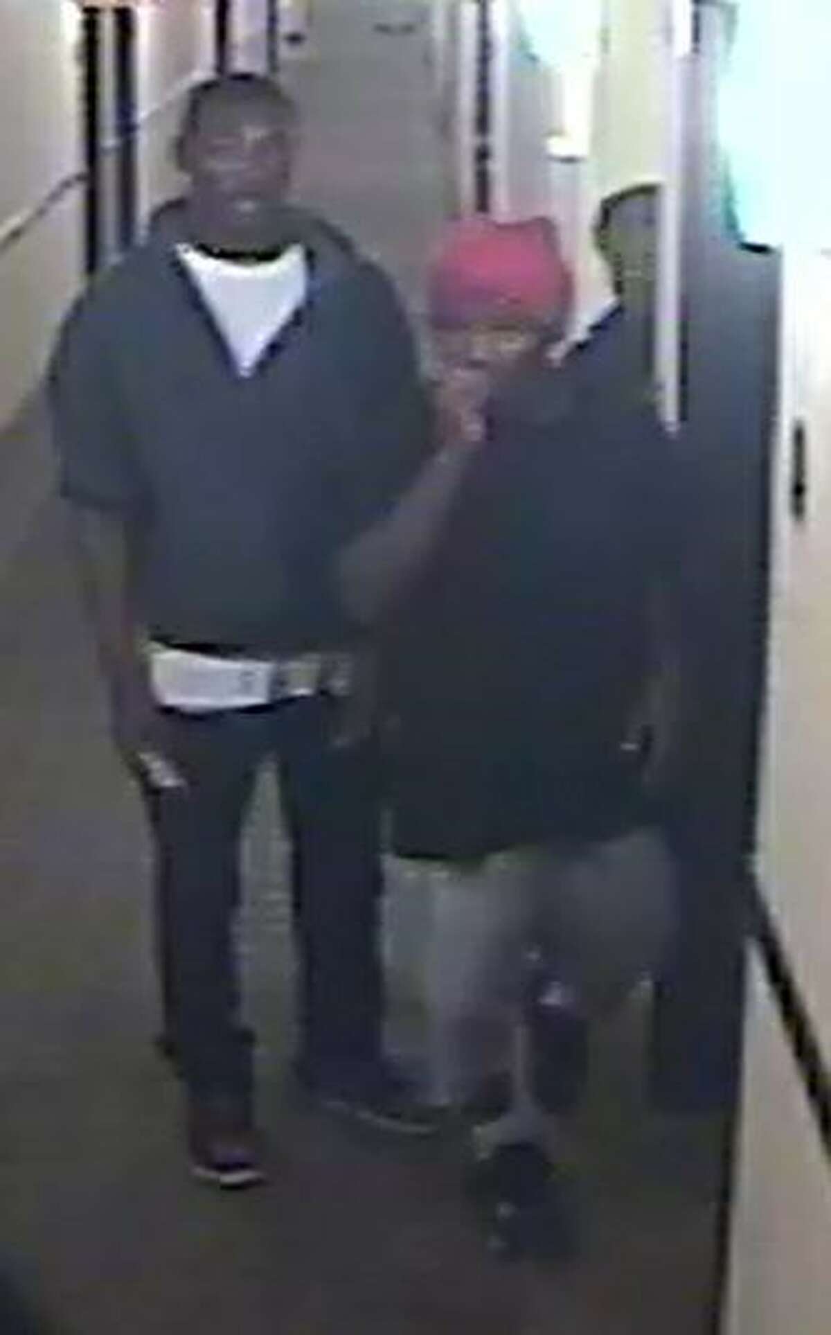 Police are searching for a group of men suspected of robbing a Northeast Side hotel in November.