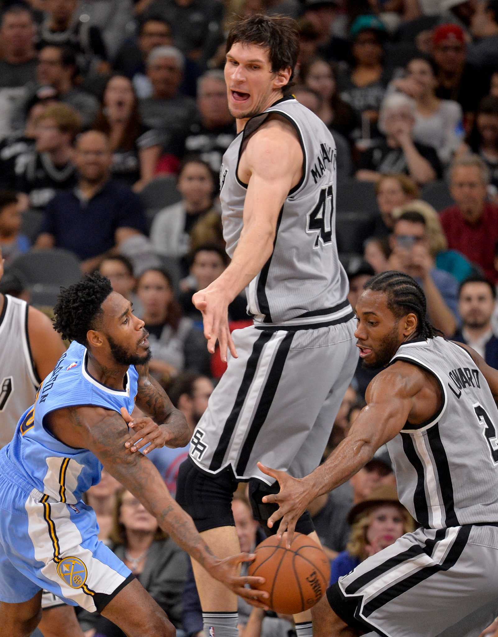 Boban Marjanovic. He ain't pretty but Huge Hands and a Huge Body.