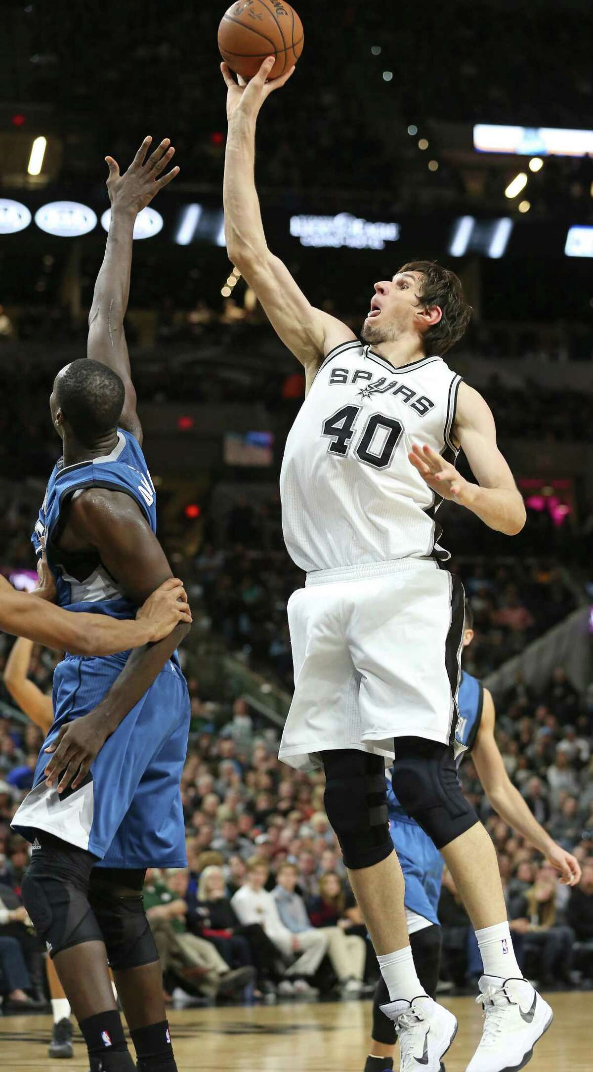 Boban Marjanovic puts up a shot during a good run in the second half as the Spurs host the Minnesota Timberwolves at the AT&T Center on December 28, 2015.