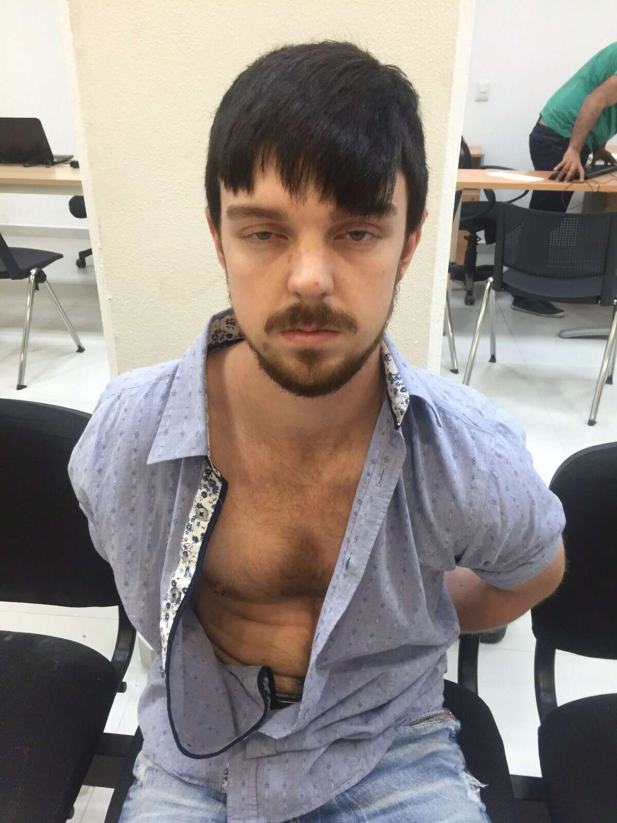This Dec. 28, 2015 photo released by Mexico's Jalisco state prosecutor’s office shows who authorities identify as Ethan Couch, after he was taken into custody in Puerto Vallarta, Mexico. U.S. authorities said the Texas teenager serving probation for killing four people in a drunken-driving wreck after invoking an "affluenza" defense, was in custody in Mexico, weeks after he and his mother disappeared. (Mexico's Jalisco state prosecutor’s office via AP)