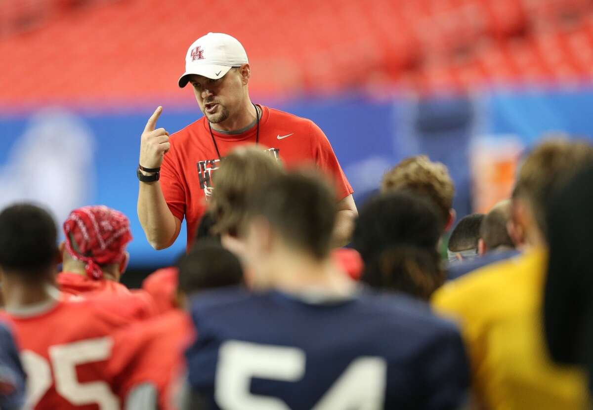 Houston Cougars head coach Tom Herman talks to his team before practice at the Georgia Dome on Tuesday, December 29, 2015. University of Houston Cougars football team practice at the Georgia Dome on Tuesday, Dec. 29, 2015, in Houston. ( Elizabeth Conley / Houston Chronicle )