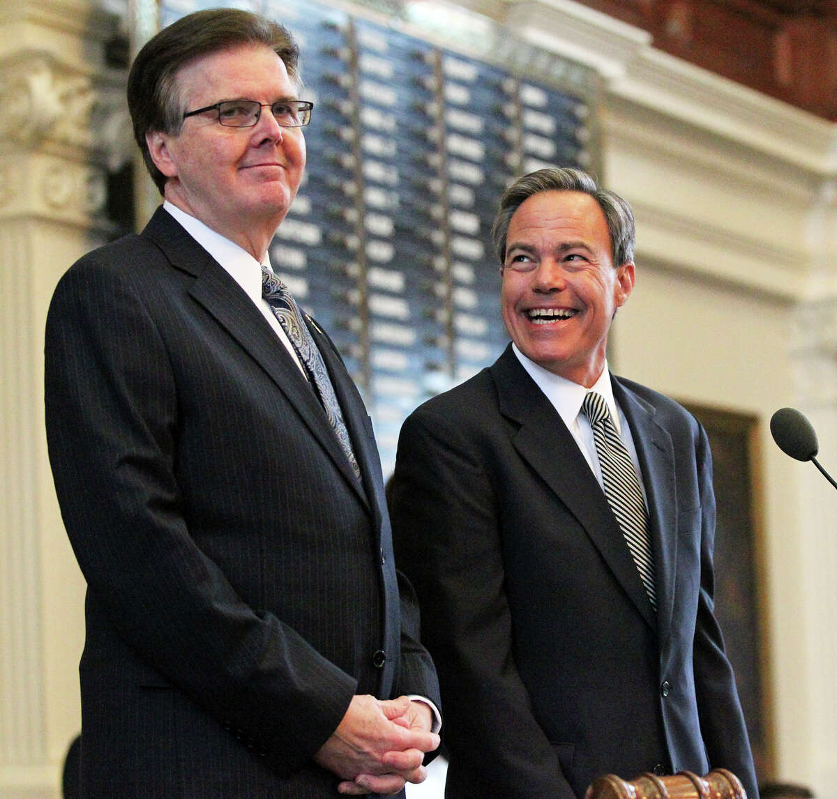 Lt. Gov. Dan Patrick and Speaker Joe Straus chat before Governor Greg Abbott delivers his State of the State address before a joint session of the Legislature held in the House of Representatives on February 17, 2015