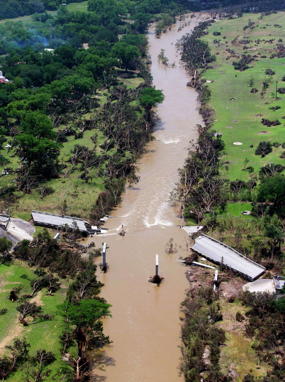 Damage from Memorial Day weekend flooding on the Blanco River in Wimberley is seen in a Tuesday May 26, 2015 aerial picture.