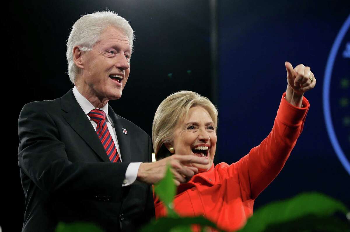 Former President Bill Clinton and his wife, Democratic presidential candidate Hillary Rodham Clinton, wave to supporters after the Iowa Democratic Party's Jefferson-Jackson fundraising dinner. The former president will hit the campaign trail for his wife this month.