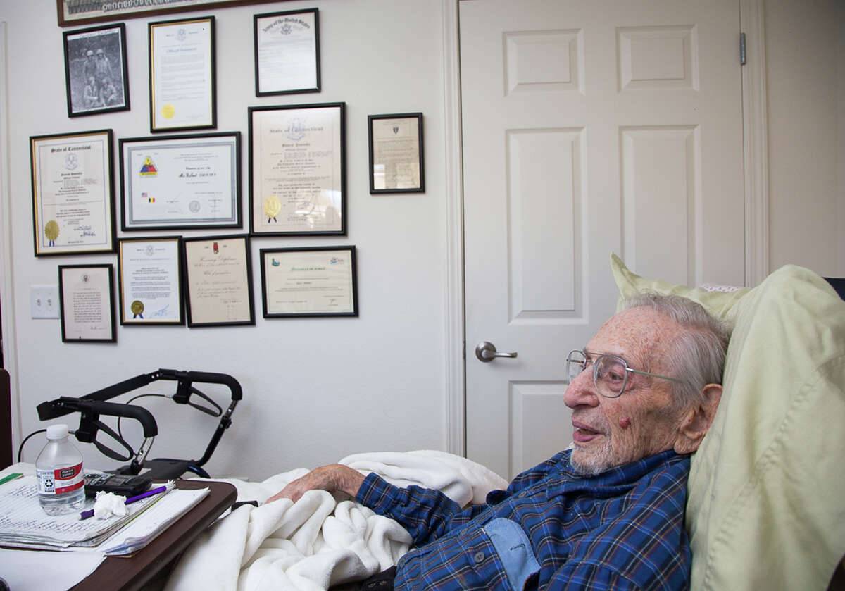 Nurse Jeanette Hutchinson checks U.S. Army veteran Bob SwriskyâÄôs vital signs, during a home care visit.