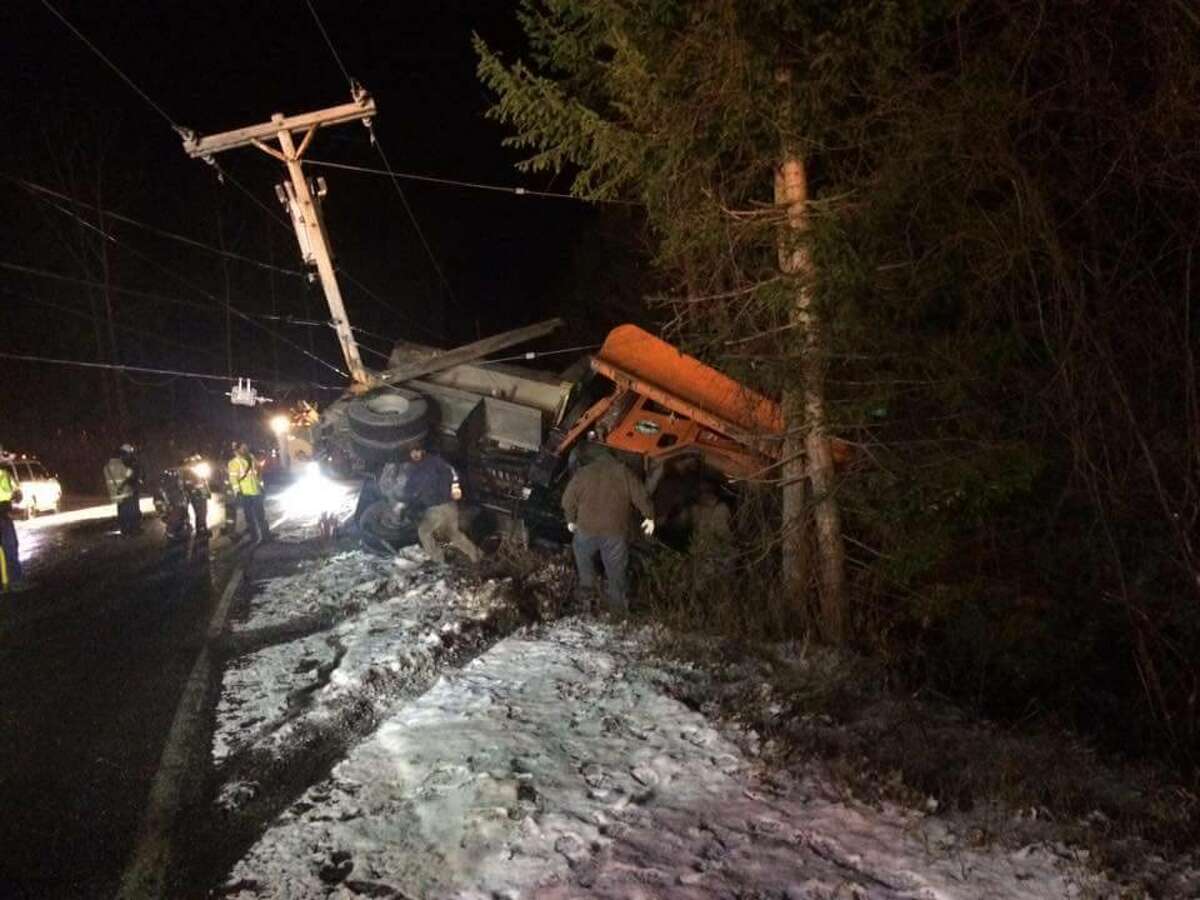 Schoharie County workers trapped two hours in overturned plow truck