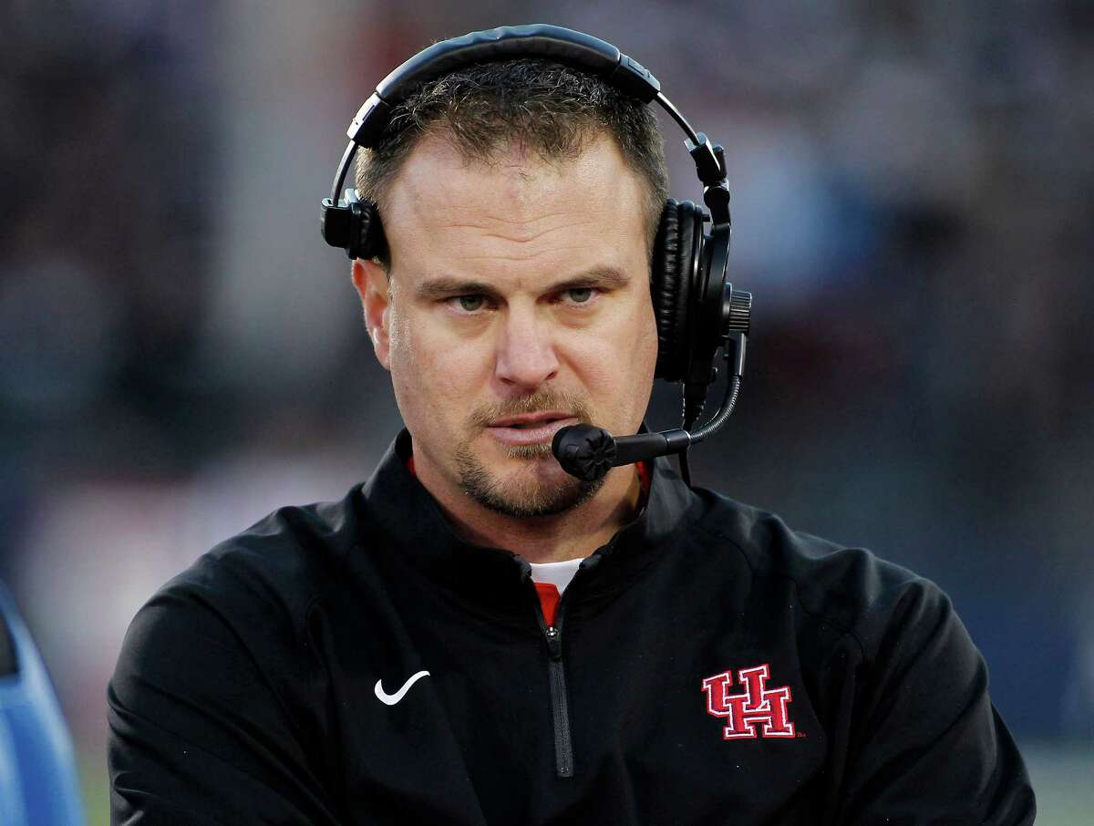 Houston head coach Tom Herman watches his team on the sideline during the first half of an NCAA college football game against Connecticut, Saturday, Nov. 21, 2015, in East Hartford, Conn. (AP Photo/Stew Milne)