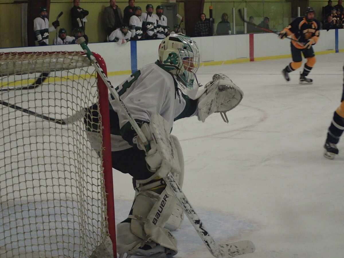 New Milford freshman goalie Ben Marano made 24 saves in a 4-3 victory over East Haven at the Canterbury School's Drady Rink Monday night, Jan. 4, 2016.