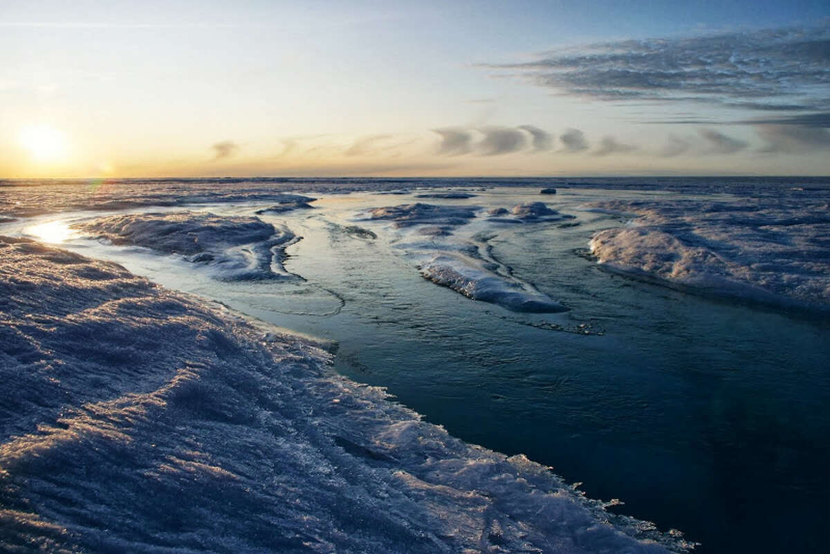 These beautiful photos of Greenland ice sheet rivers should freak you out