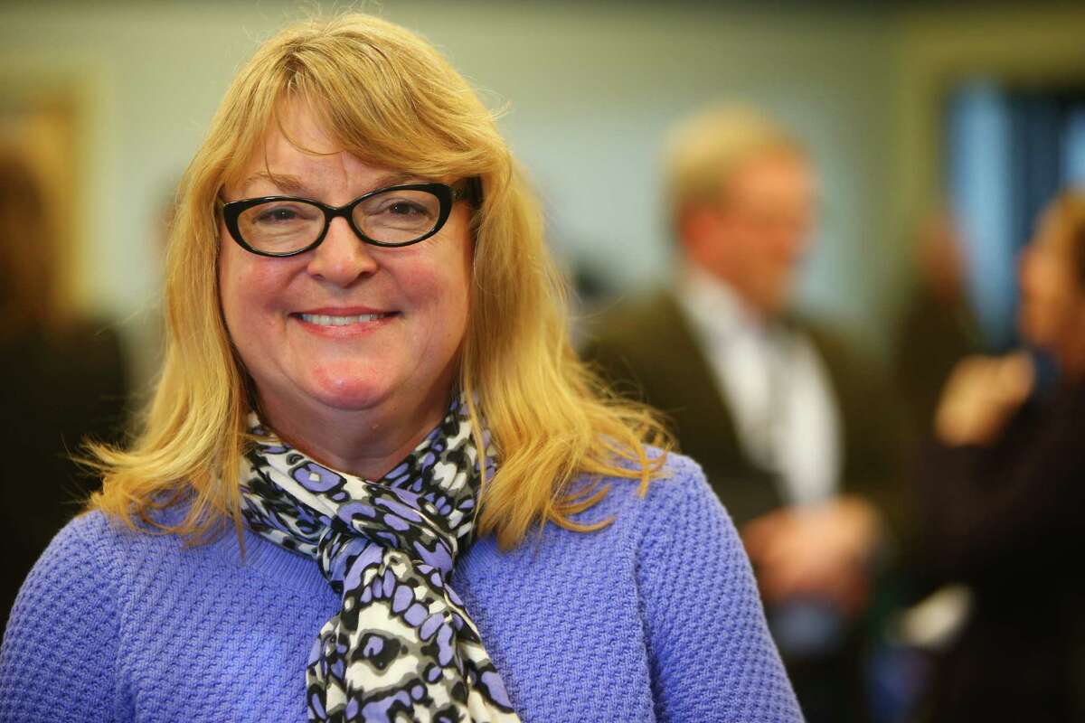 Cheryl Stumbo, survivor of the 2006 shooting at the Jewish Federation in Seattle, was present at a press conference where Governor Jay Inslee's announced an executive order to help prevent gun-related violence and deaths and implement at statewide suicide prevention plan at Navos Mental Health and Wellness Center, Wednesday, Jan. 6, 2016.