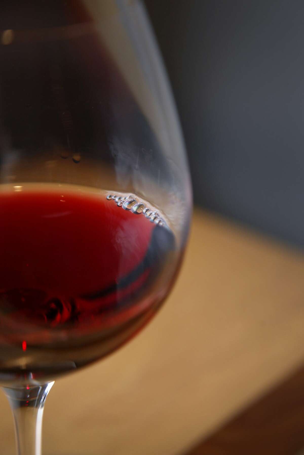 A glass of pinot at Cartograph Wines tasting room in Healdsburg, Calif., on Saturday, January 2, 2015.