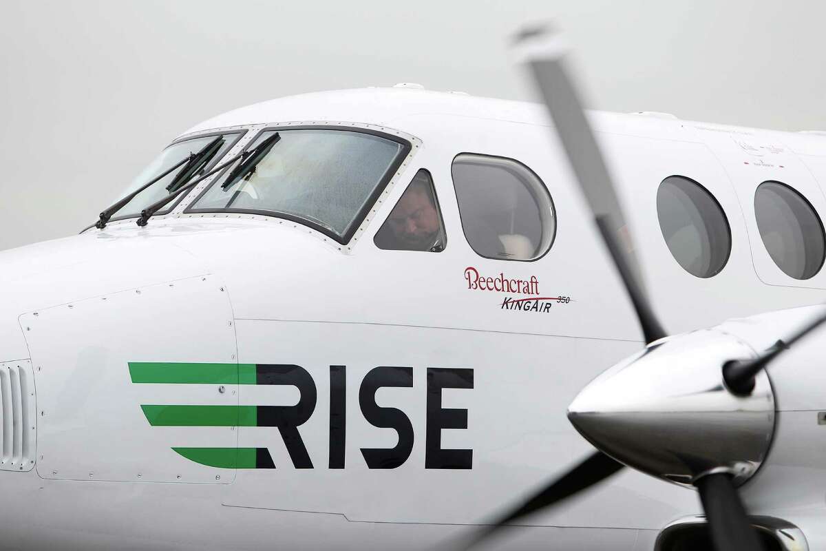 Captain Darel Belz starts the propellers of a Rise aircraft Thursday, Jan. 7, 2016, in Houston. Rise is a Dallas-based company where members pay a monthly fee to share a private jet for scheduled flights between cities such as Houston and Dallas. ( Steve Gonzales / Houston Chronicle )