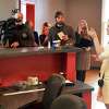 Chief operating officer Hillary Peckham, right, speaks as Etain holds an Open House at their medical marijuana dispensary Thursday, Jan. 7, 2016, in Albany, N.Y. (John Carl D'Annibale / Times Union)