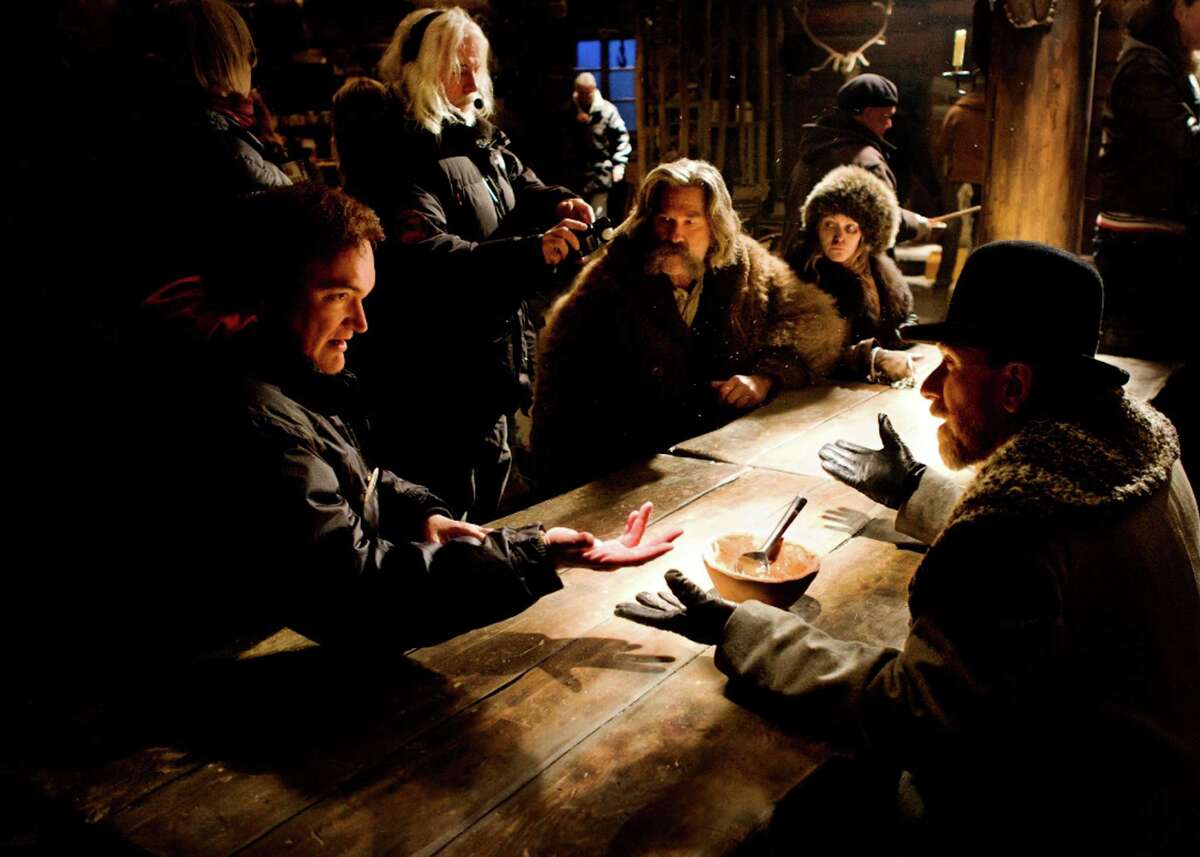 H8 Tarantino on set A SONG IN HIS HEART Quentin Tarantino had never really worked with a composer for his films before "The Hateful Eight"; he was relieved to find the legendary Ennio Morricone wanted to make him "comfortable." Photo: Courtesy of The Weinstein Company