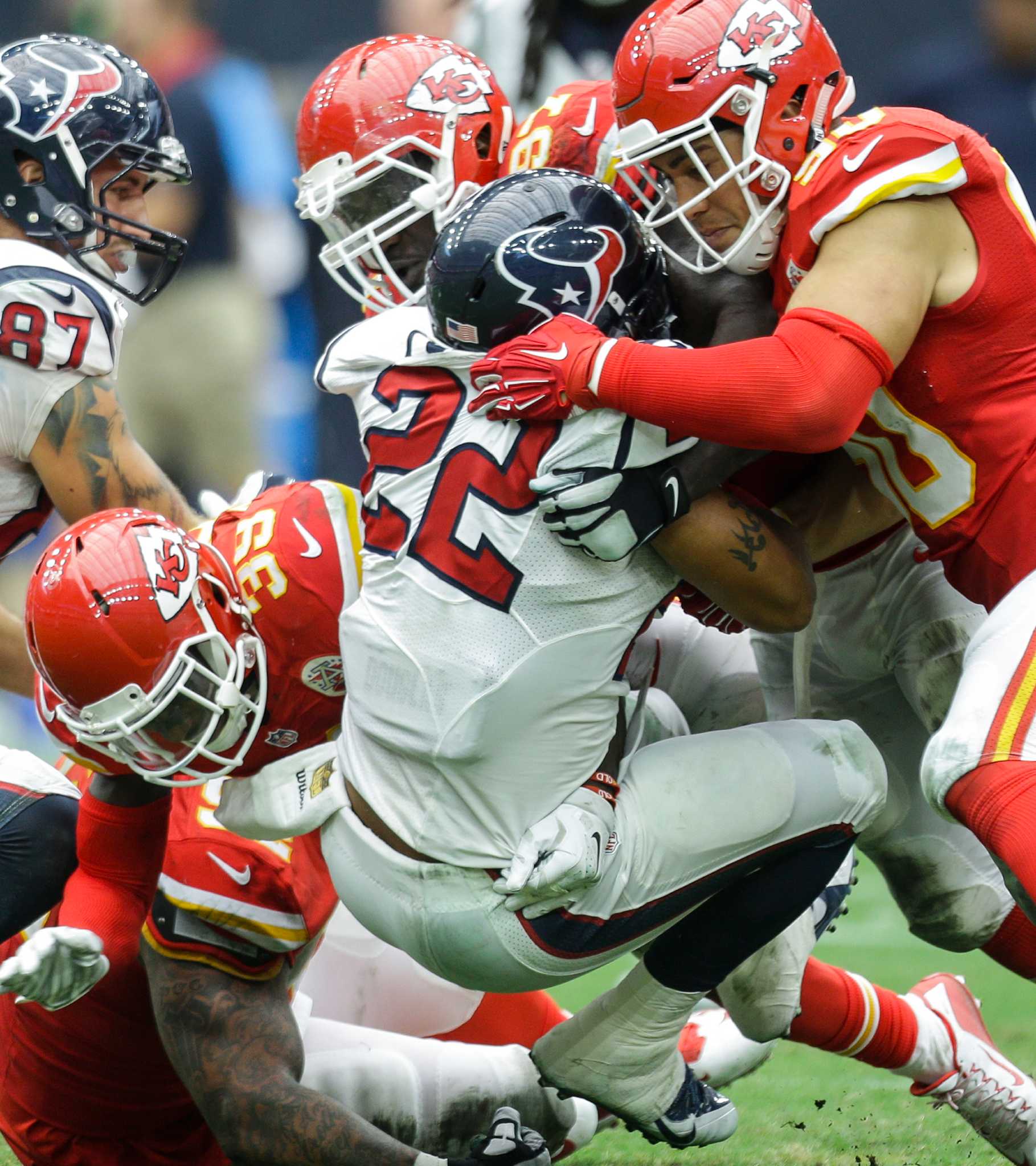 Kansas City Chiefs free safety Husain Abdullah carries the ball after  intercepting a pass and running it back 39 yards for a touchdown during the  fourth quarter of an NFL football game