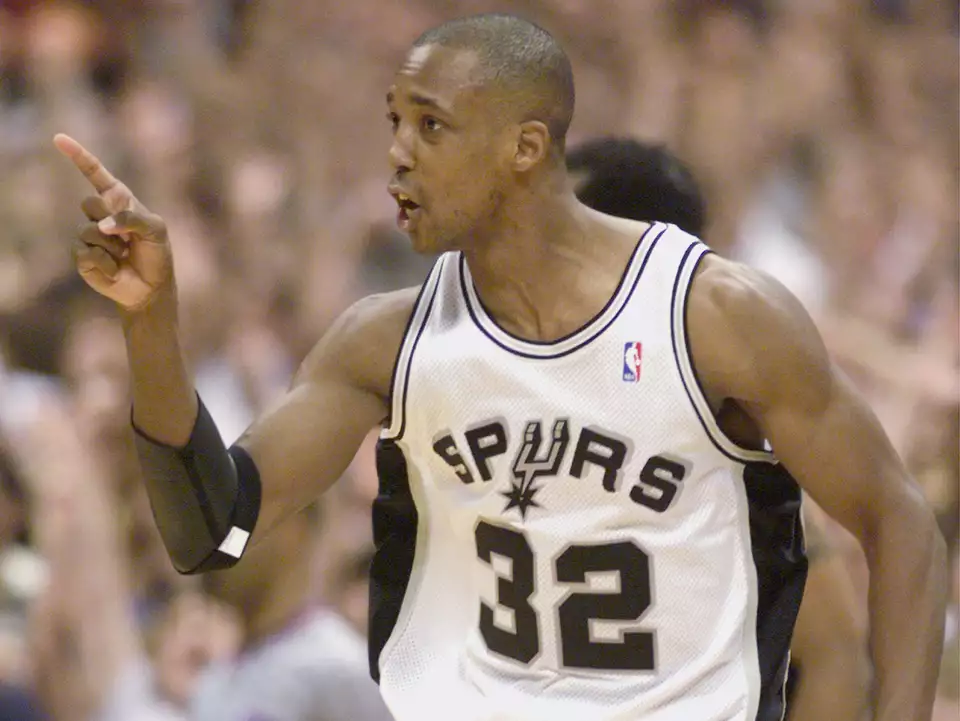 Art Bayern ranks Sean Elliott as his favorite player. Here's Elliott reacting after burying the 3-point shot to win Game 2 of the Western Conference finals against Portland on May 31, 1999 at the Alamodome.