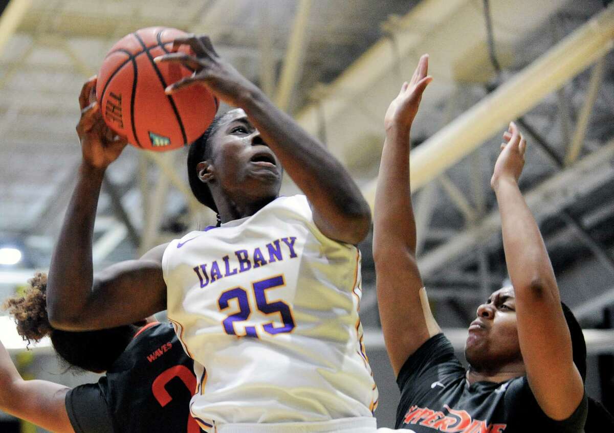 UAlbany's Shereesha Richards (25) drives to the basket against Pepperdine during the first half of an NCAA women's college basketball game on Sunday, Nov. 15, 2015, in Albany, N.Y. (Hans Pennink / Special to the Times Union) ORG XMIT: HP104