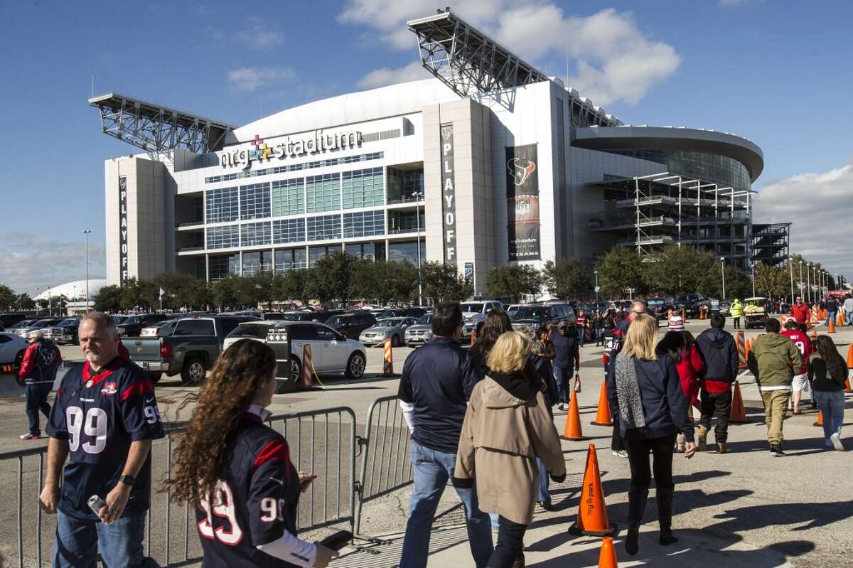 Houston Texans fans arrive at the stadium before an AFC wildcard playoff game between the Texans and the Chiefs at NRG Stadium on Saturday, Jan. 9, 2016, in Houston.