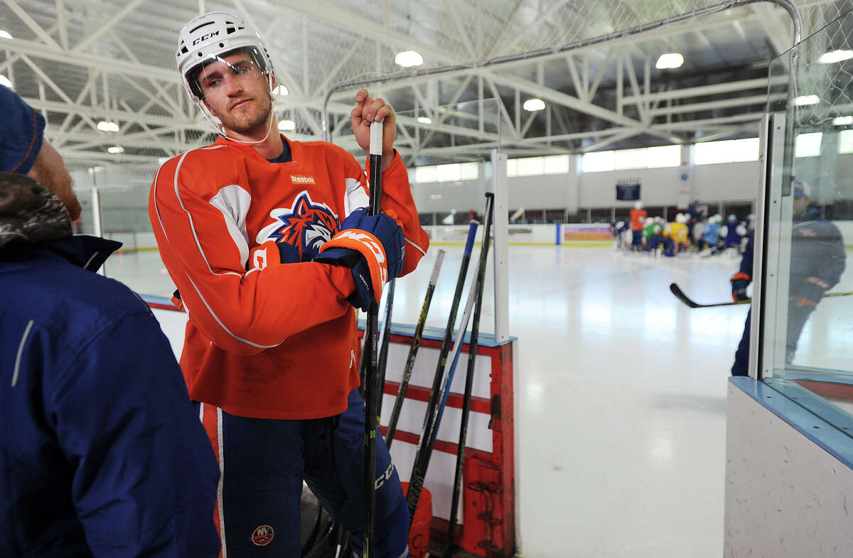 Bridgeport Sound Tiger Justin Florek prepares to take to the ice during his team's practice at the Wonderland of Ice in Bridgeport, Conn. on Tuesday, January 5, 2016. The two rinks at the facility are in high demand during the winter season. The AHL team has practiced at the facility for five years.