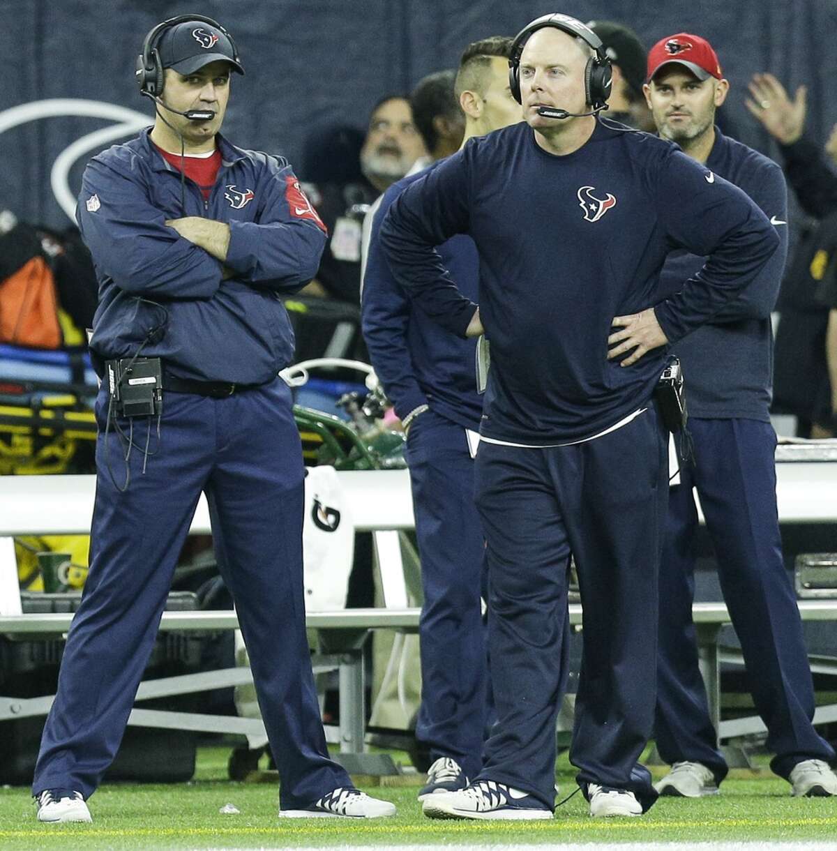 Houston Texans head coach Bill O'Brien and offensive coordinator George Godsey stand on the sidelines during the third quarter of the AFC Wildcard playoff game against the Kansas City Chiefs at NRG Stadium on Saturday, Jan. 9, 2016, in Houston. ( Brett Coomer / Houston Chronicle )
