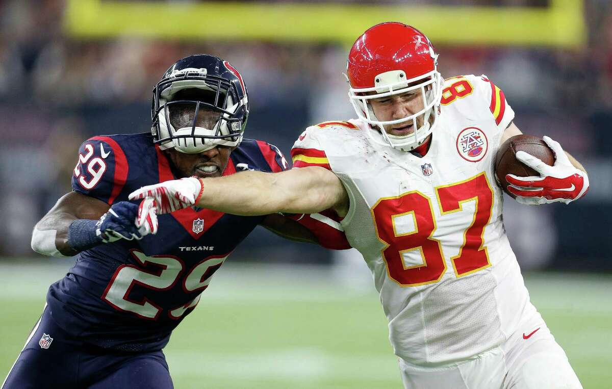 Kansas City Chiefs tight end Travis Kelce (87) makes a catch against Houston Texans free safety Andre Hal (29) during the third quarter of an AFC Wildcard playoff game at NRG Stadium on Saturday, Jan. 9, 2016, in Houston. ( Karen Warren / Houston Chronicle )