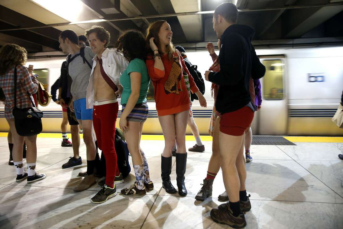 No Pants! Subway Ride 2016 participants wait to board a train at Embarcadero station in San Francisco, Calif., on Sunday, January 10, 2016.