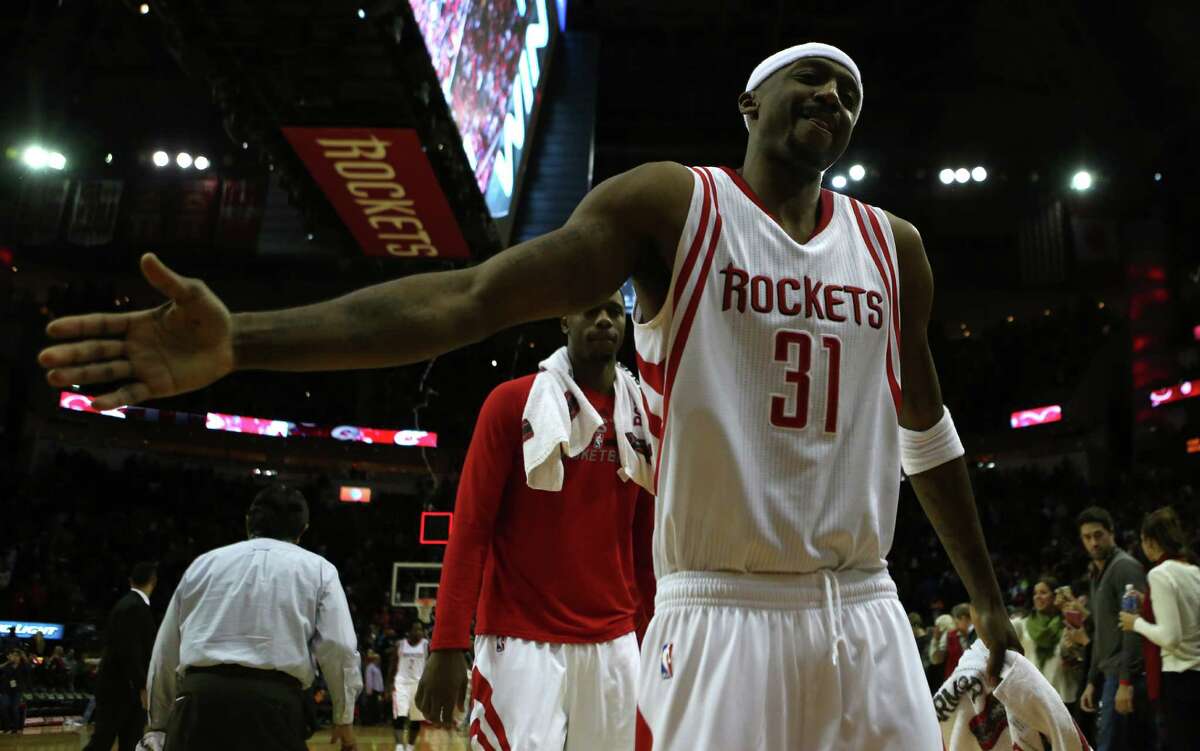 Houston Rockets guard Jason Terry (31) extends his hand to greet a fan on the sidelines after the overtime victory over the Indiana Pacers 107-103, Sunday, Jan. 10, 2016, in Houston.