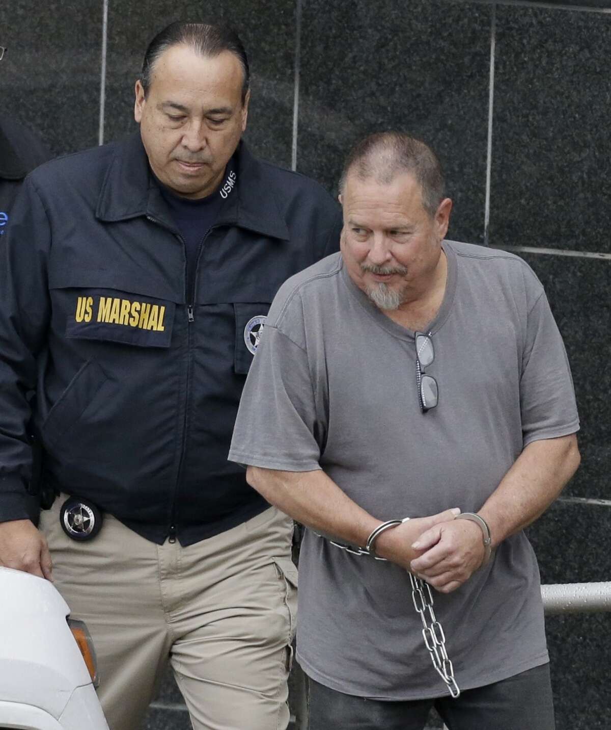 Jeffrey Fay Pike, 60, of Conroe, the national president of the Bandidos Motorcycle Club, is escorted from the Bob Casey Federal Courthouse, 515 Rusk, after an appearance in federal court, where he faced several charges related to his alleged activity with the Bandidos Motorcycle Club shown Wednesday, Jan. 6, 2016, in Houston. ( Melissa Phillip / Houston Chronicle ) Jeffrey Ray Pike is escorted by a U. S. Marshal after an appearance in federal court, where he faced several charges related to his alleged activity with the Bandidos Motorcycle Club Wednesday, Jan. 6, 2016, in Houston. ( Melissa Phillip / Houston Chronicle )
