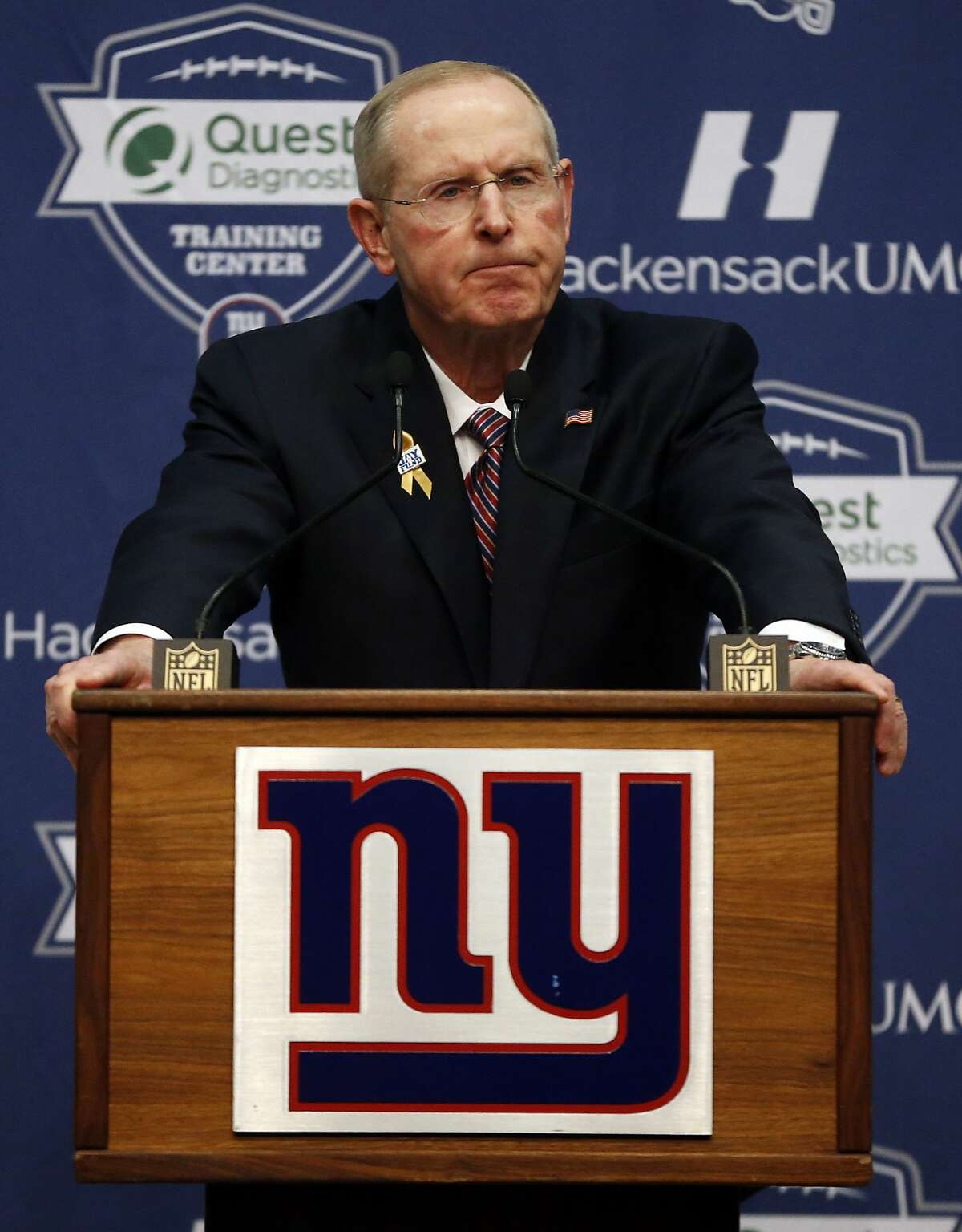 Former New York Giants head coach Tom Coughlin speaks during a news conference, Tuesday, Jan. 5, 2016, in East Rutherford, N.J. (AP Photo/Julio Cortez)