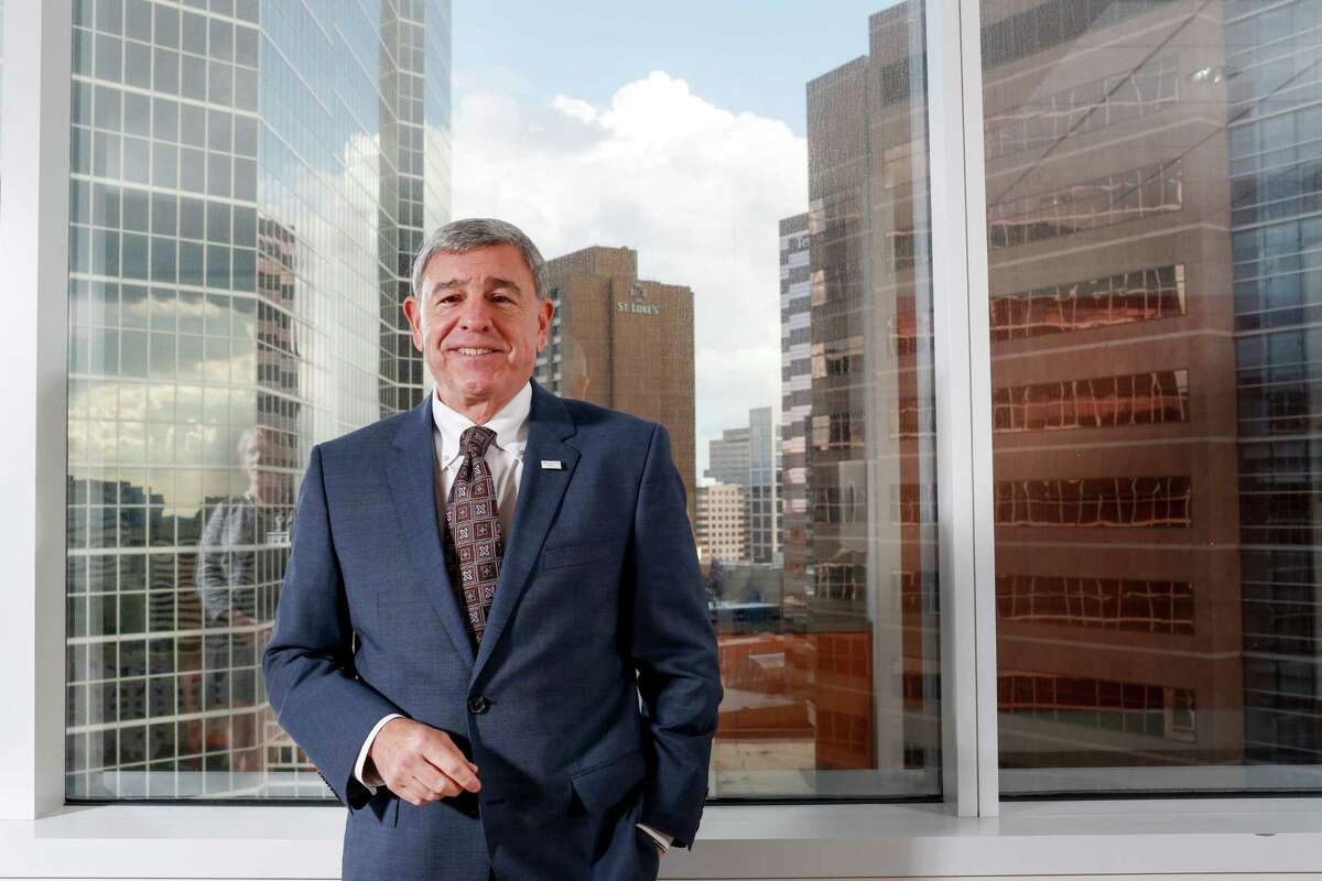 Depposed St. Luke's Health System CEO Michael Covert will continue serving as president until a replacement is selected and takes over, a change in the original plan for an interim leader to be named in July.