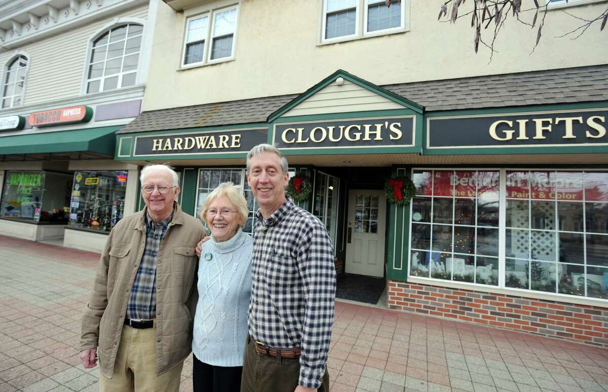 Ron Sr., Evelyn and Ronnie Clough stand outside Clough's Hardware in Stratford, which was started by Ron Clough's father in 1933. The store on Main Street, across from Paradise Green is closing after more than eight decades in business.