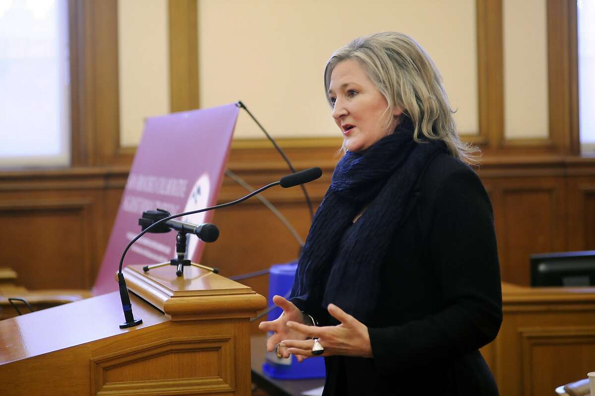 Annemarie Conroy, assistant US attorney for the northern district of California, speaks after receiving an award during a San Francisco Collaborative Against Human Trafficking ceremony held at City Hall in San Francisco, CA on Tuesday, January 12, 2016.