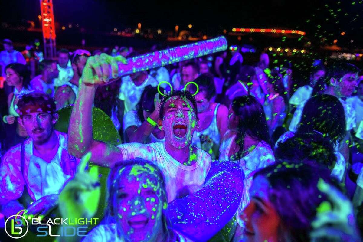 Blacklight slide party, a water-themed rave for all ages, is coming to ...