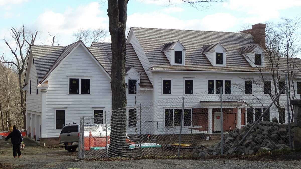A house nears completion in on North Street in Greenwich. According to U.S. Census Bureau estimates, Greenwich had among the highest totals of both permits for new houses and total dollar value of those projects of any municipality in Connecticut.