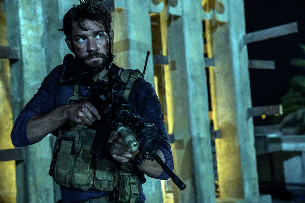 In this photo provided by Paramount Pictures shows John Krasinski as Jack Silva in the film, "13 Hours: The Secret Soldiers of Benghazi" from Paramount Pictures and 3 Arts Entertainment/Bay Films. The movie releases in U.S. theaters Jan. 15, 2016. (Christian Black/Paramount Pictures via AP)