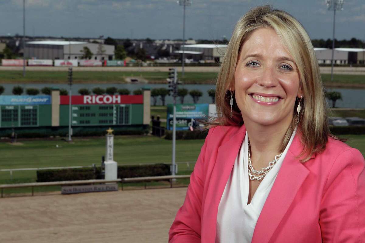 Sam Houston Race Park President Andrea Young poses for a portrait in one of the park's suites Thursday, July 18, 2013, in Houston. ( James Nielsen / Houston Chronicle )