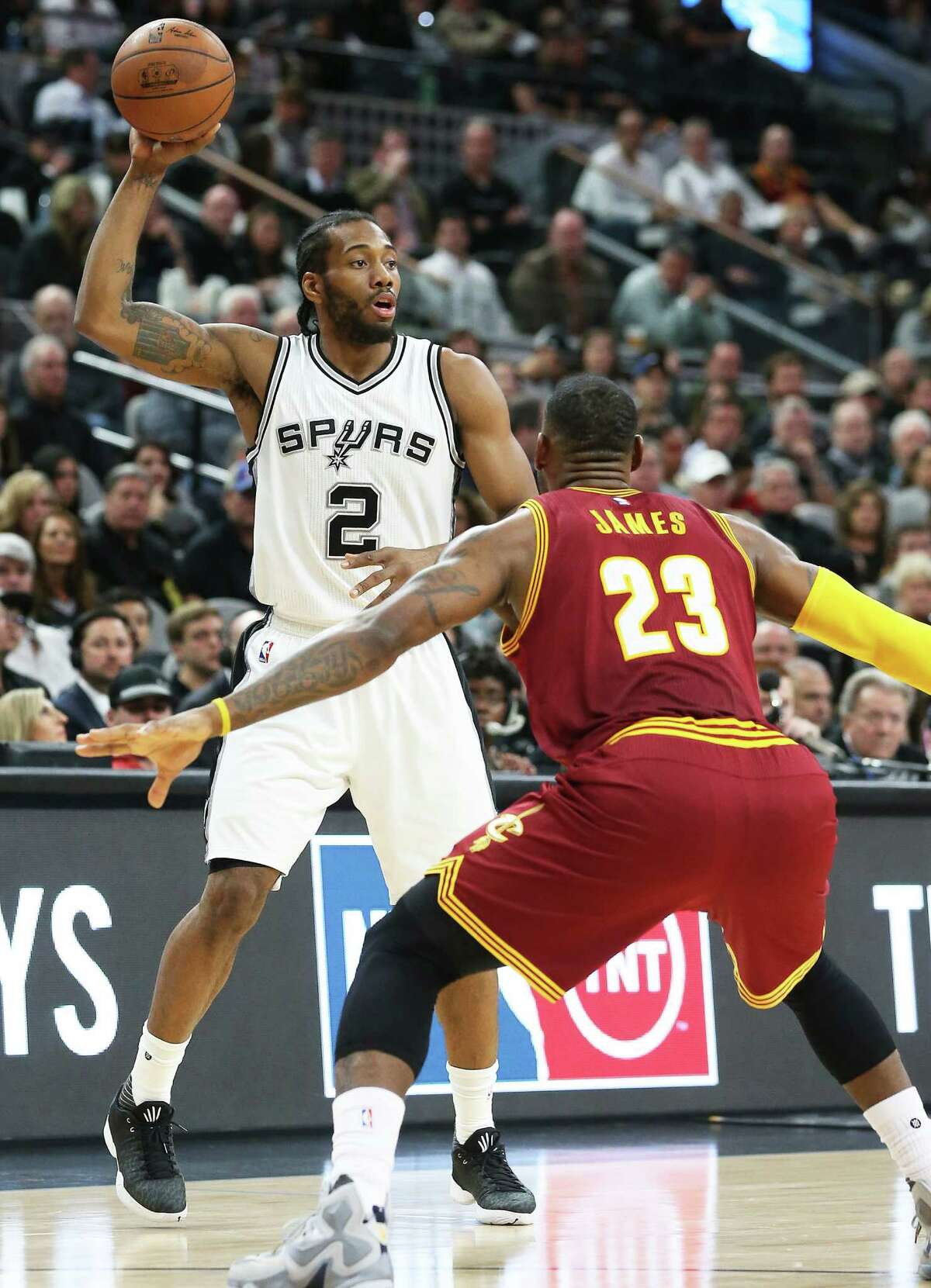 Kawhi Leoanrd starts a play against LeBron James as the Spurs host the Cavaliers att he AT&T Center on January 14, 2016.
