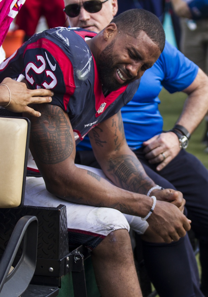 Houston Texans running back Arian Foster (23) breaks away from