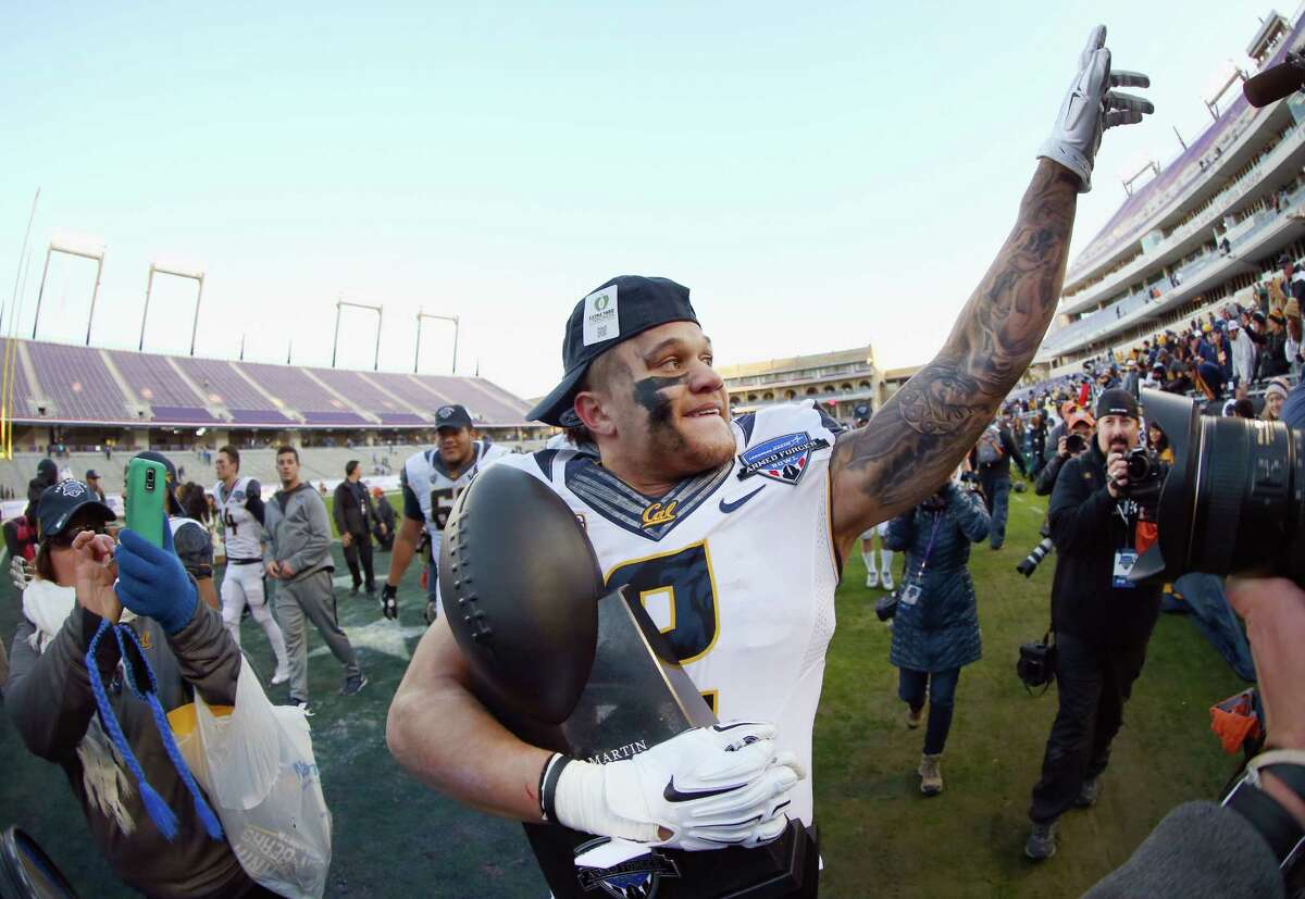 Daniel Lasco #2 of the University of California Golden Bears celebrates with the championship trophy after beating the Air Force Falcons 55-36 in the Lockheed Martin Armed Forces Bowl at Amon G. Carter Stadium on December 29, 2015 in Fort Worth, Texas.