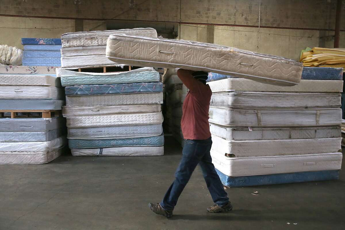 Old mattress dumped for free under new state program