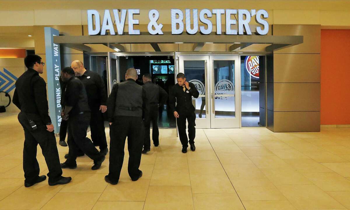 Dave & Buster’s employees undergo training during a pre-opening celebration for the staff at The Shops at Riverenter.